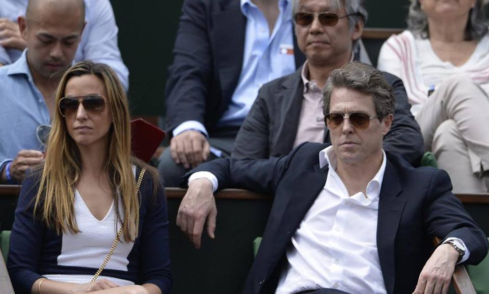 Hugh Grant watching Federer's match