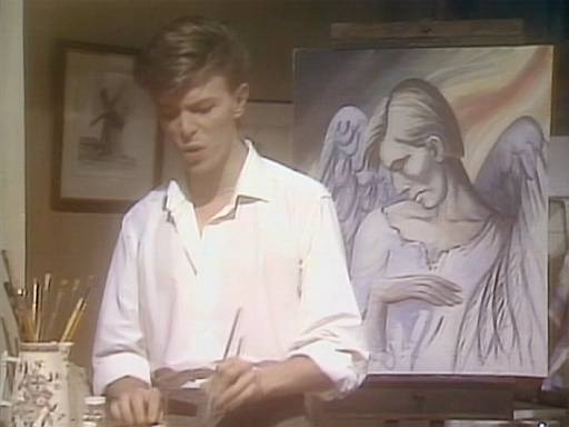 David Bowie’s 1979 music video for ‘Look Back in Anger’, he paints a portrait of himself as an angel.