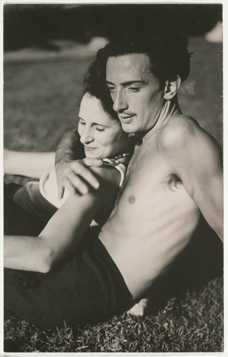 Salvador Dalí and Gala, lying on the grass in an affectionate attitude ca. 1933